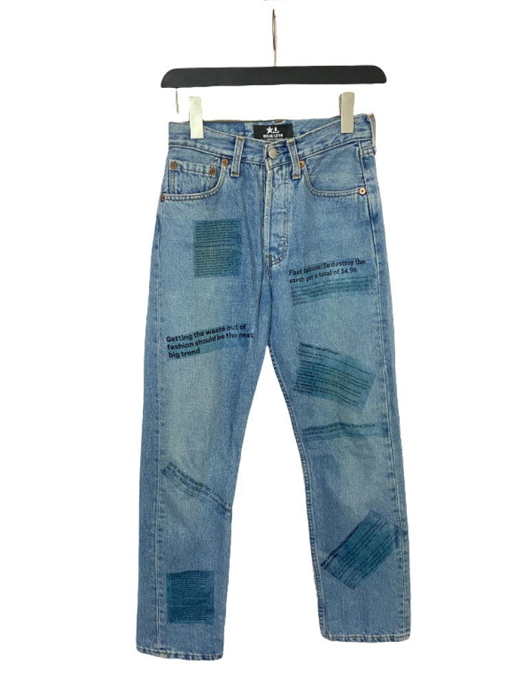Upcycled denim jeans featuring News print
